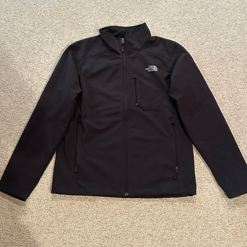 The North Face Men's Black Jacket with front zipper pockets